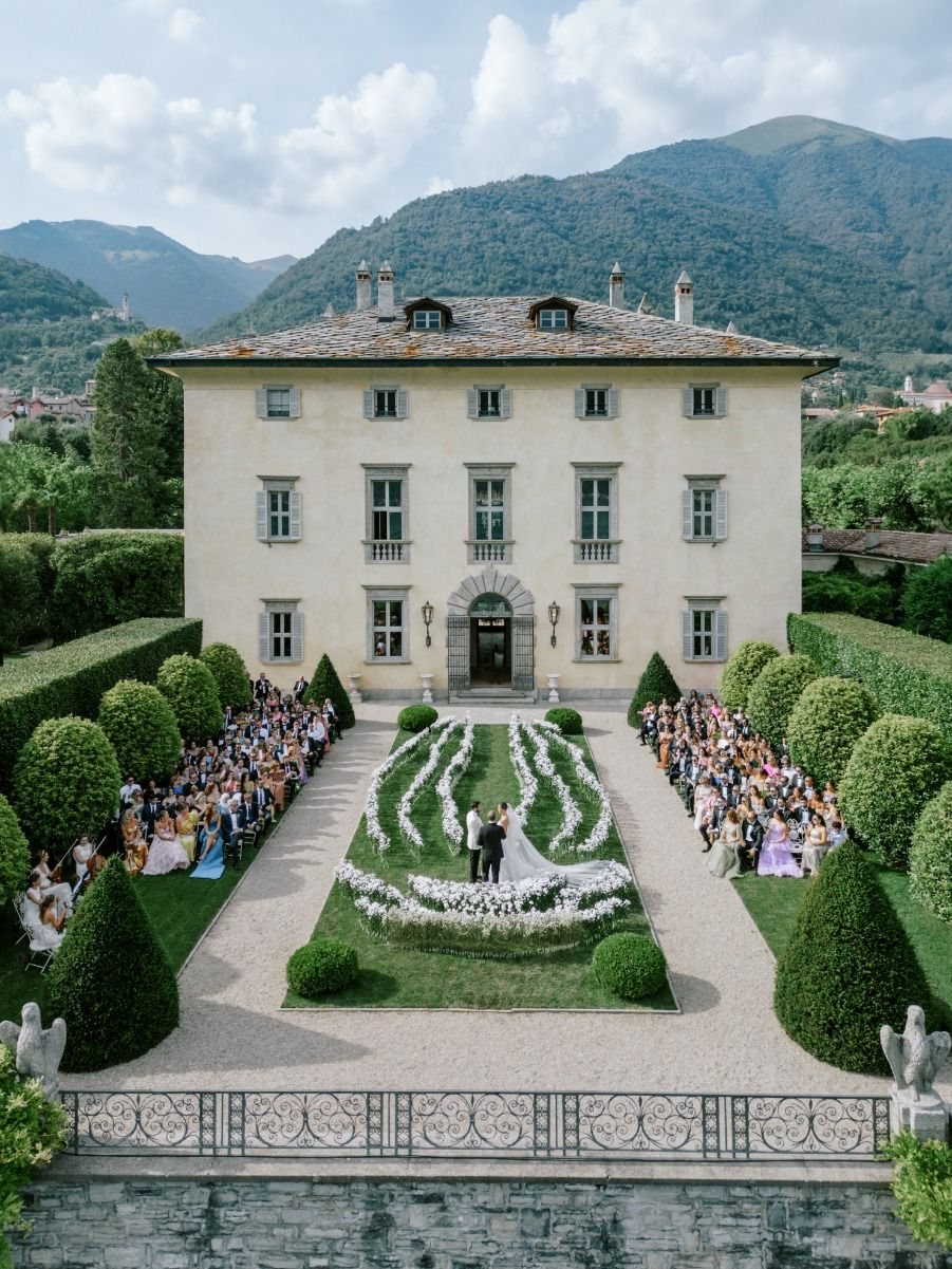 Aerial view of a garden wedding ceremony at a private villa